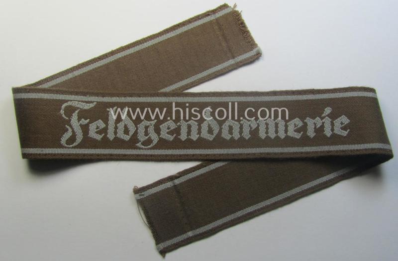 Just minimally worn example of a WH (Heeres) cuff-title ie. armband (ie. 'Ärmelstreifen') entitled: 'Feldgendarmerie' (being a typical 'semi-BeVo'-woven example)