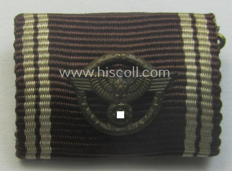 Single-pieced, N.S.D.A.P.-related ribbon-bar (ie. 'Band- o. Feldspange') showing the ribbon for an: 'N.S.D.A.P. DA in Bronze' (ie. '3. Stufe für 10 Jahre t. Dienste')