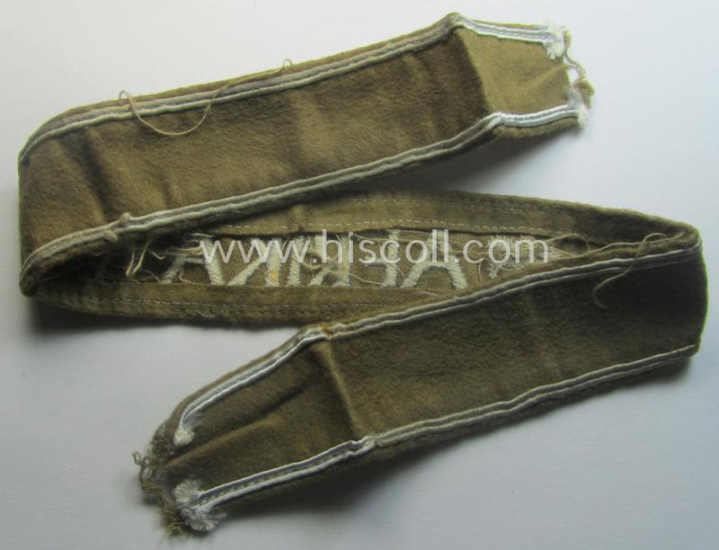 Moderately used, WH cuff-title (ie. 'Ärmelstreifen') entitled: 'Afrika' (being a hardly shortened example that comes in an overall very nice- (ie. issued and clearly worn ie. once tunic-attached-), condition