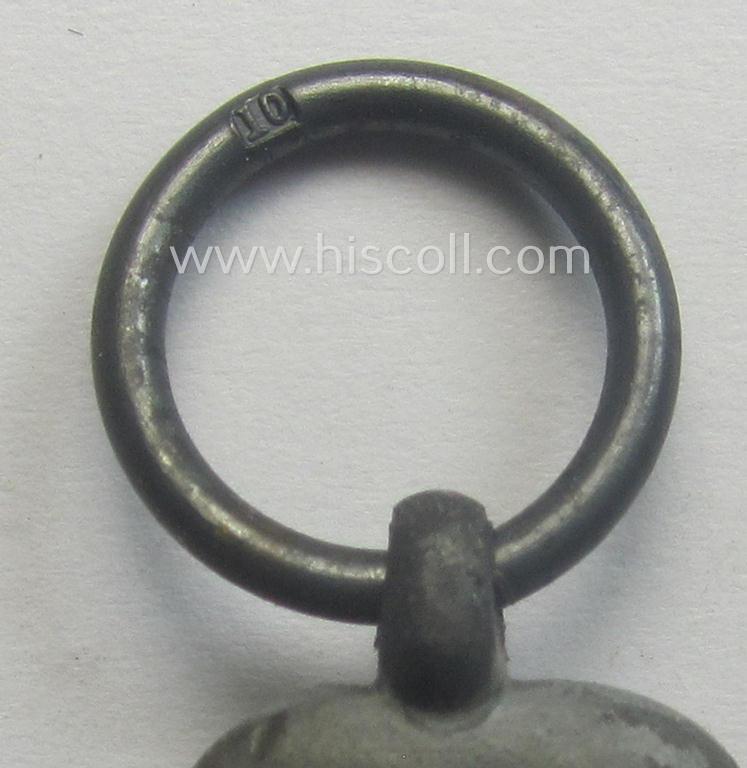 Fully matching medal-set: 'Winterschlacht im Osten 1941/42' as produced by the: 'Foerster & Barth'-company being a clearly maker- (ie. '10'-marked) specimen that came stored in its original 'Zellstoff'-based pouch of issue as found