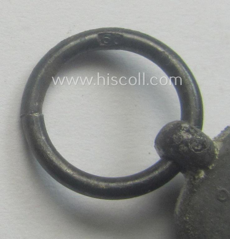 Fully matching medal-set: 'Winterschlacht im Osten 1941/42' as produced by the: 'Katz & Deyhle'-company being a clearly maker- (ie. '60'-marked) specimen that came stored in its original 'Zellstoff'-based pouch of issue as found