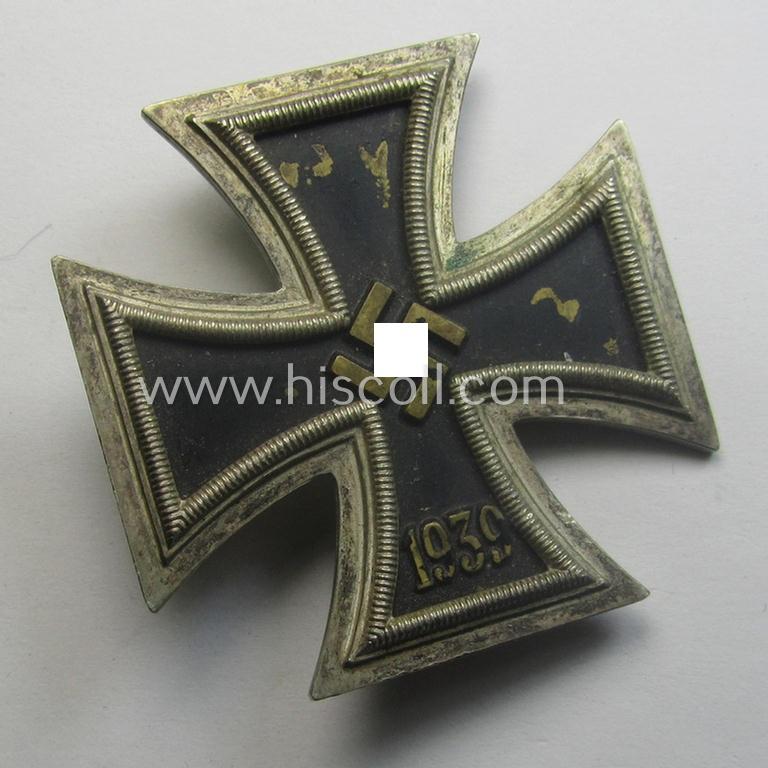 'Eisernes Kreuz 1. Kl.' (or: Iron Cross 1st class) being a typical maker- (ie. '15'-) marked example that as was produced by the Austrian maker (ie. 'Hersteller'): 'Friedrich Orth' and that comes as issued and worn
