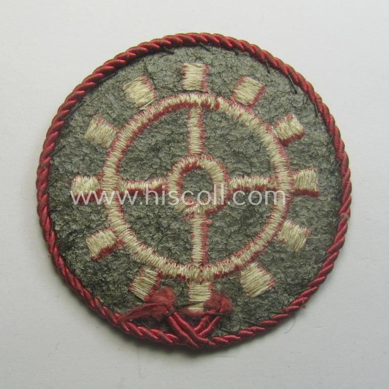 WH (Heeres ie. 'Panzer'-) machine-embroidered-, trade- ie. special-career patch, having a not that often encountered (bright-pink-coloured) 'Kordel' (ie. 'Umrandung') attached, as was intended for a: 'Panzerwarte o. Kfz.-Warte der I. Kl.'