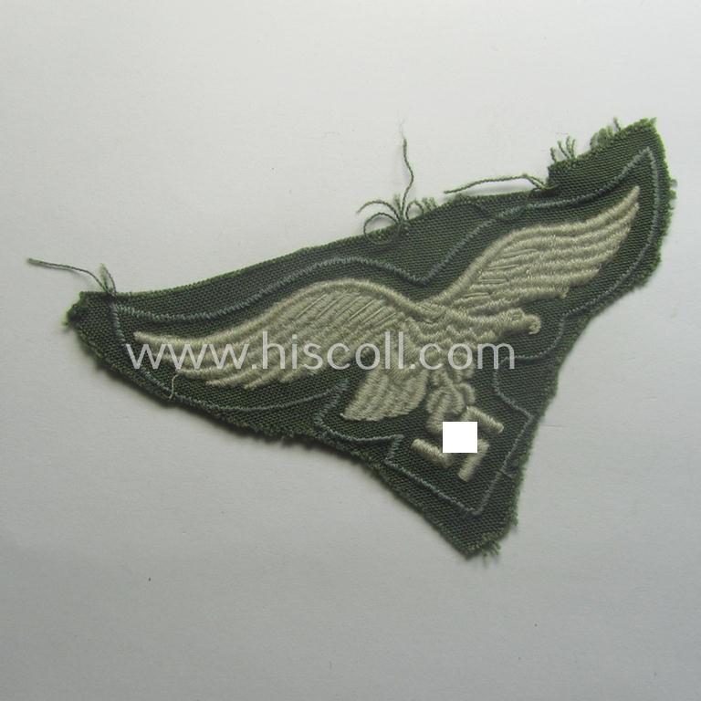 WH (Luftwaffe) machine-embroidered breasteagle, as was specifically intended for usage on the paratrooper-jumpsmocks (ie. 'FJ-Knochensäcke')