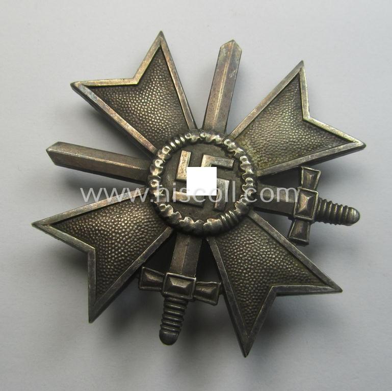 'Kriegsverdienstkreuz 1. Klasse mit Schwertern' as executed in typical, silverish-coloured metal (ie. 'Buntmetall') being a clearly maker- (ie. '1'-) marked specimen by the desirable maker: 'Deschler & Sohn'