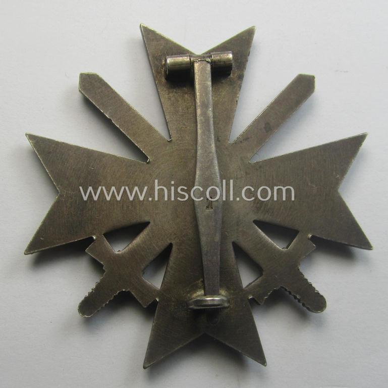 'Kriegsverdienstkreuz 1. Klasse mit Schwertern' as executed in typical, silverish-coloured metal (ie. 'Buntmetall') being a clearly maker- (ie. '1'-) marked specimen by the desirable maker: 'Deschler & Sohn'
