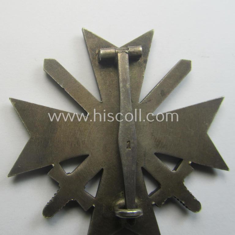 'Kriegsverdienstkreuz 1. Klasse mit Schwertern' as executed in typical, silverish-coloured metal (ie. 'Buntmetall') being a clearly maker- (ie. '1'-) marked specimen by the desirable maker: 'Deschler & Sohn'