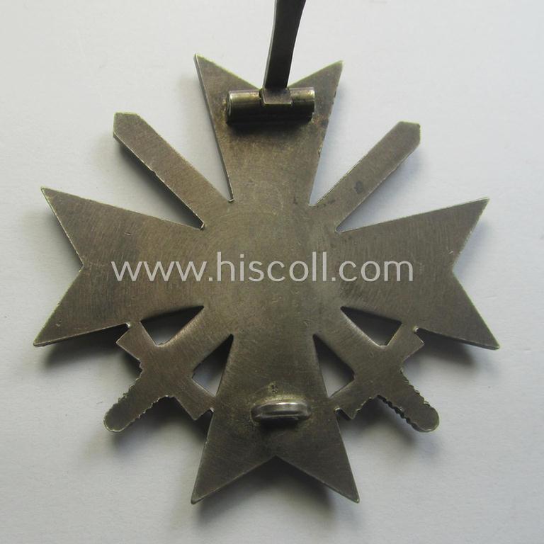 'Kriegsverdienstkreuz 1. Klasse mit Schwertern' as executed in typical, silverish-coloured metal (ie. 'Buntmetall') being a clearly maker- (ie. '1'-) marked specimen by the desirable maker: 'Deschler & Sohn'