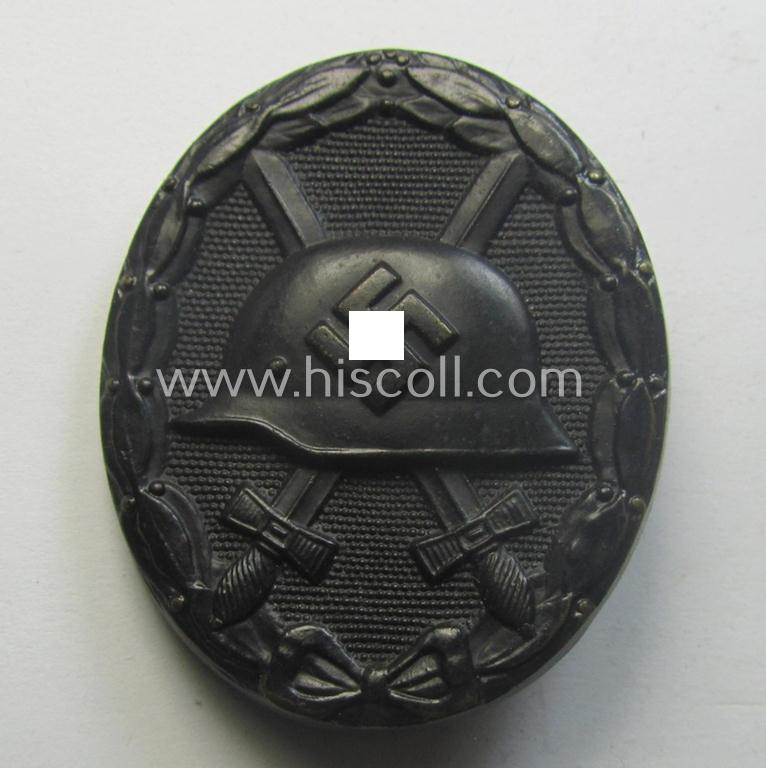 Medal-set: 'Verwundeten-Abz. in Schwarz' (or: black wound-badge) being a maker- (ie. 'L/11'-) marked specimen that comes packed in its original (generic-styled and 2-pieced) 'LDO'-type box of issue (both marked by the: 'Wilhelm Deumer'-company)