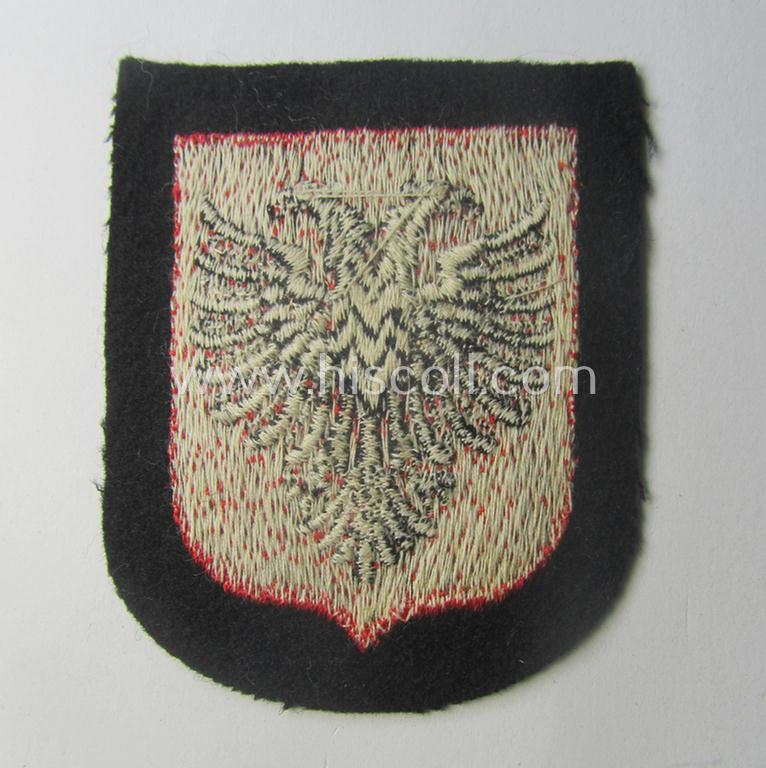 Waffen-SS 'volunteer'-arm-shield as was intended for usage by soldiers of the: '21. Waffen-Grenadier-Division der SS' “Skanderbeg” (ie. 'albanische Nr. 1') and that comes in a 'virtually mint- ie. unissued', condition