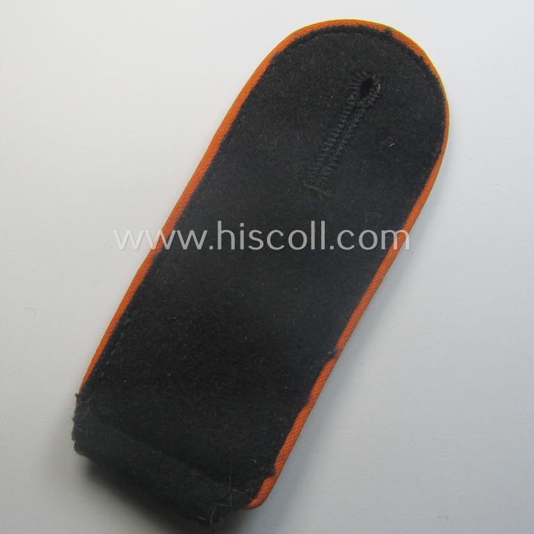 Single, Waffen-SS, EM-type shoulderstrap as piped in the bright-orange-coloured branchcolour as was intended for usage by an: 'SS-Mann' who served within the: 'SS-Feldgendarmerie-Trpn.'