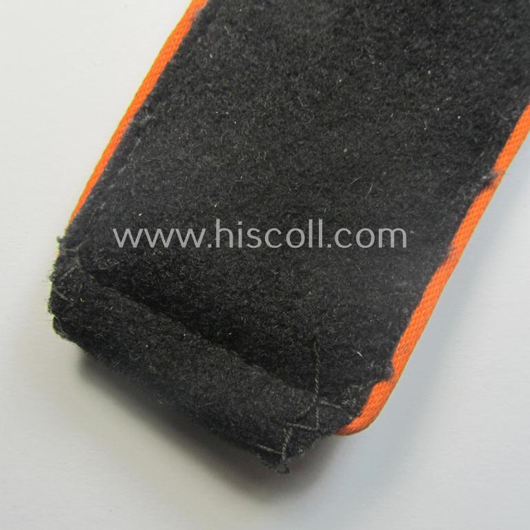 Single, Waffen-SS, EM-type shoulderstrap as piped in the bright-orange-coloured branchcolour as was intended for usage by an: 'SS-Mann' who served within the: 'SS-Feldgendarmerie-Trpn.'