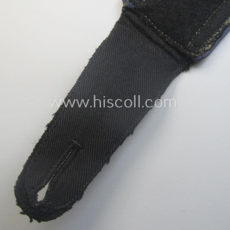 Single, Waffen-SS, NCO-type shoulderstrap as piped in the darker-blue-coloured branchcolour as was intended for usage by an: 'SS-Unterscharführer' who served within the: 'SS-Sanitäts-Trpn.'