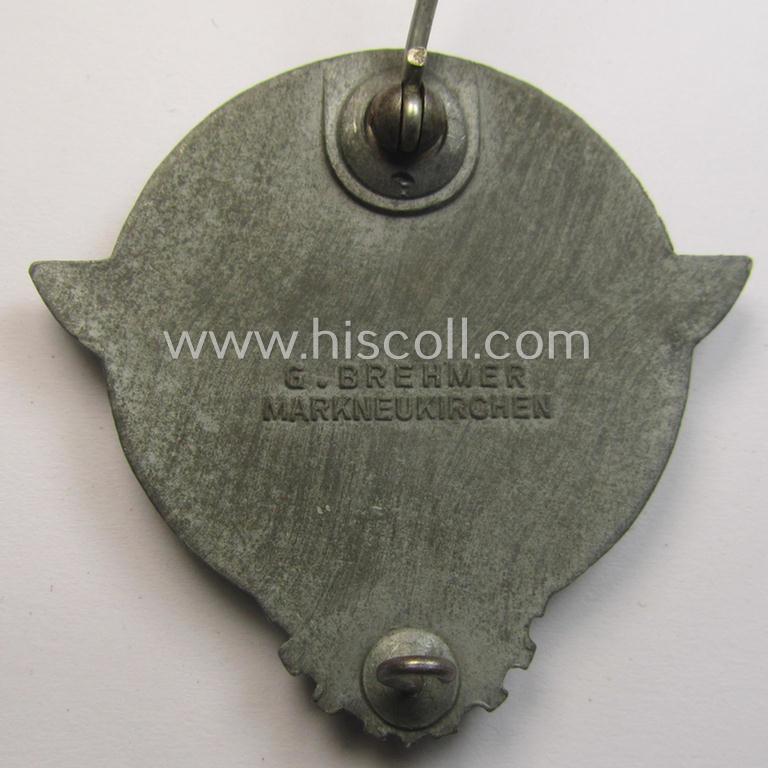 Superb - and truly scarcely encountered! - 'Feinzink'-based HJ (ie. 'Hitlerjugend') so-called: 'Reichsberufswettkampf-Siegerabzeichen' of the 2nd model, 'Gausieger 1944', being a clearly maker- (ie.: 'Gustav Brehmer'-) marked example