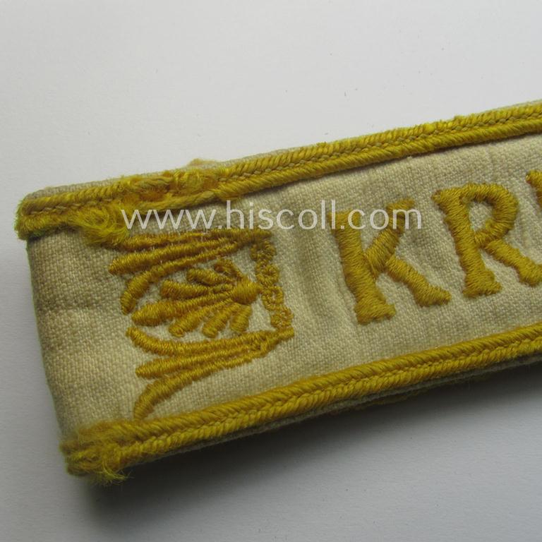 Truly worn WH cuff-title (ie. 'Ärmelstreifen') entitled: 'Kreta' (being an example that bears a printed 'RbN.'-numeral and that comes in an issued-, clearly worn- and/or most certainly once tunic-attached, condition)