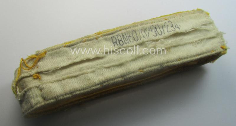 Truly worn WH cuff-title (ie. 'Ärmelstreifen') entitled: 'Kreta' (being an example that bears a printed 'RbN.'-numeral and that comes in an issued-, clearly worn- and/or most certainly once tunic-attached, condition)