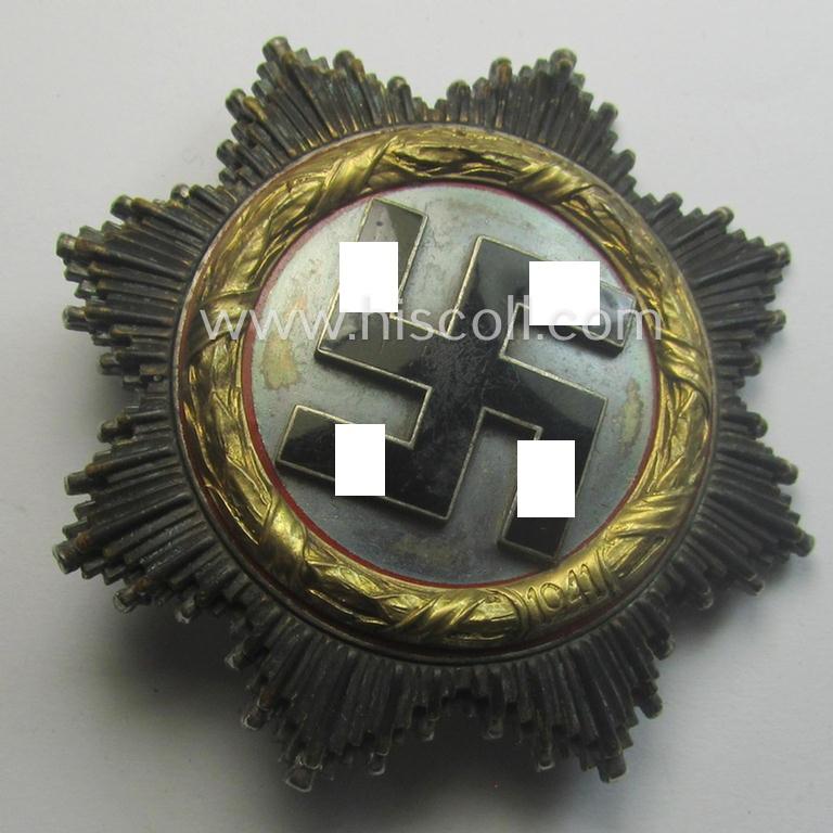 Attractive, neatly maker- (ie. '20'-marked-) example of WH (Heeres, LW etc.) 'Deutsches Kreuz im Gold' (or DKiG) being a (regular- ie. 'light-weight') piece that was produced by the: 'C.F. Zimmermann'-company