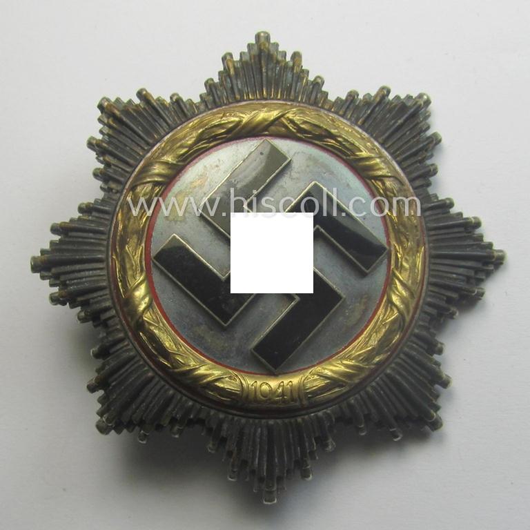 Attractive, neatly maker- (ie. '20'-marked-) example of WH (Heeres, LW etc.) 'Deutsches Kreuz im Gold' (or DKiG) being a (regular- ie. 'light-weight') piece that was produced by the: 'C.F. Zimmermann'-company