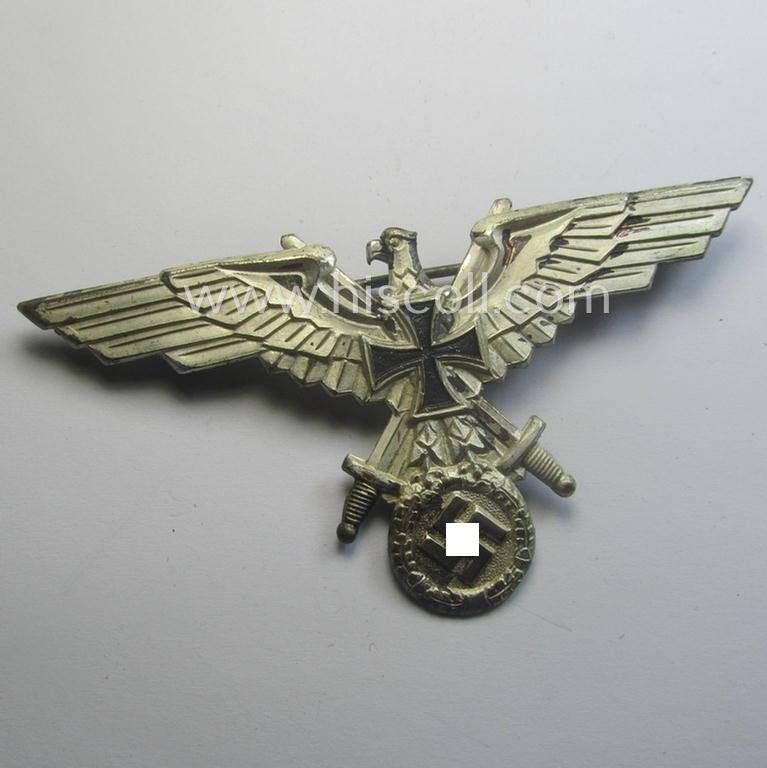 Bright-silver-toned - and I deem 'Buntmetall'-based! - so-called: D.R.K.B. (or: 'Deutscher Reichskriegerbund' aka 'Kyffhäuserbund') enlisted-mens'- (ie. NCO-) type breast-eagle (showing a black-coloured- and neatly painted iron cross-symbol)