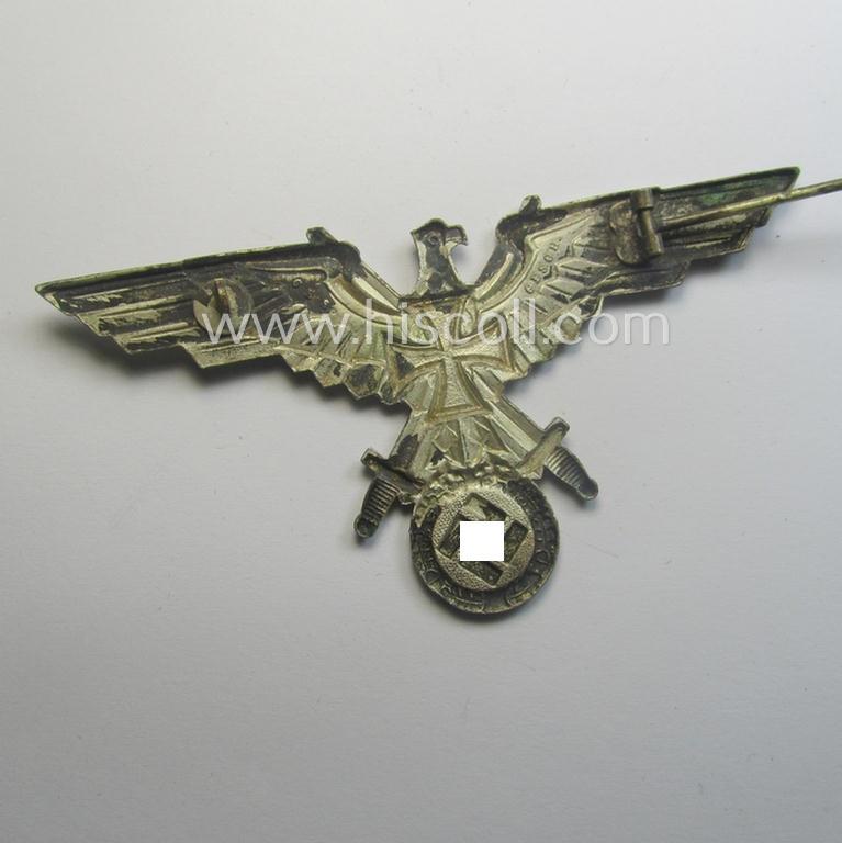 Bright-silver-toned - and I deem 'Buntmetall'-based! - so-called: D.R.K.B. (or: 'Deutscher Reichskriegerbund' aka 'Kyffhäuserbund') enlisted-mens'- (ie. NCO-) type breast-eagle (showing a black-coloured- and neatly painted iron cross-symbol)