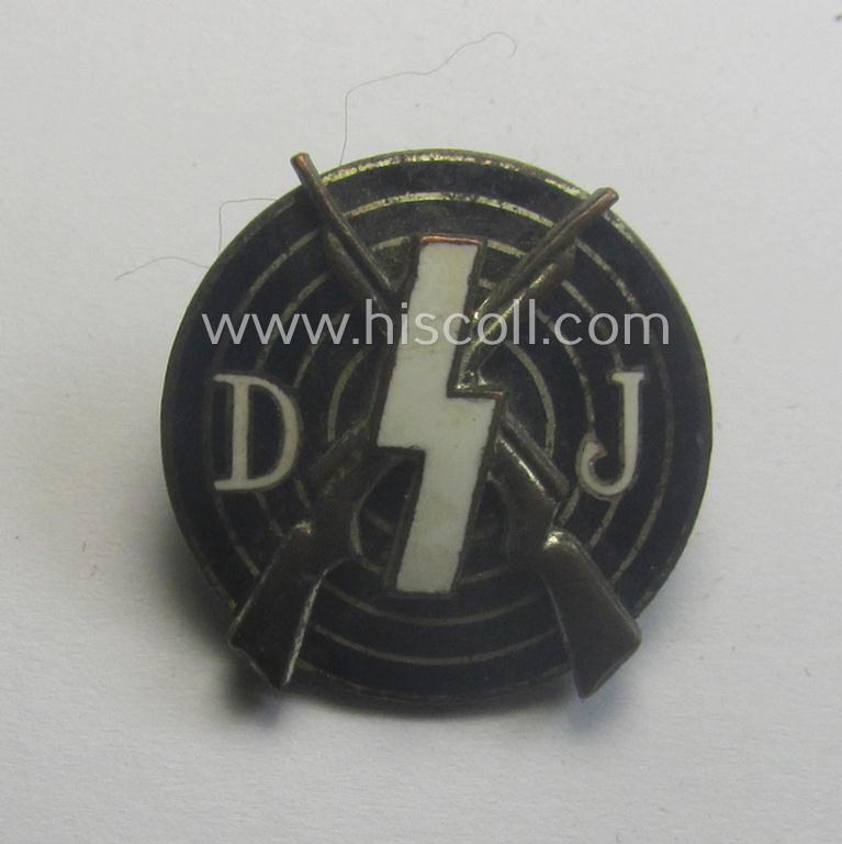 DJ (ie. 'Deutsches Jungvolk in der HJ') enamelled so-called: 'DJ-Schiessauszeichnung' (or: DJ-shooting-badge) that is nicely maker-marked: 'RzM' and/or 'M1/128' on its back