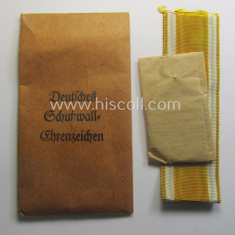 Stunning, 'Deutsches Schutzwall Ehrenzeichen' (aka: 'Westwall'-medal) being a (typical) non-maker-marked- and/or: 'Buntmetall'-based specimen that comes packed in its original pouch of issue by the: 'Friedrich Orth'-company