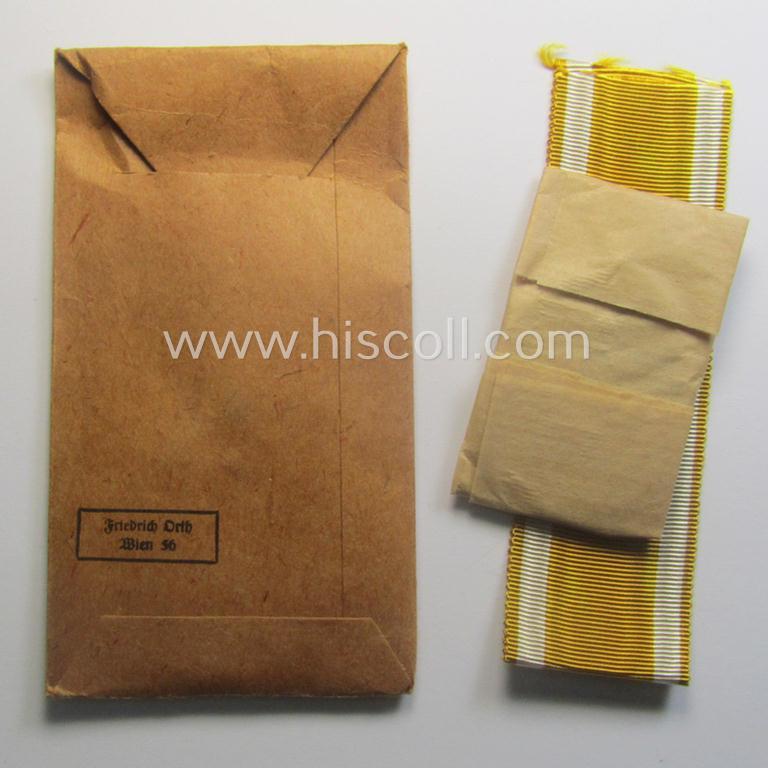 Stunning, 'Deutsches Schutzwall Ehrenzeichen' (aka: 'Westwall'-medal) being a (typical) non-maker-marked- and/or: 'Buntmetall'-based specimen that comes packed in its original pouch of issue by the: 'Friedrich Orth'-company